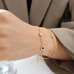 Dual Tone Roman Circle Charm Bracelet